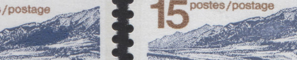 Close up of type 1 and type 2 differences on the 15c mountain sheep stamp from the 1972-1978 Caricature Issue of Canada