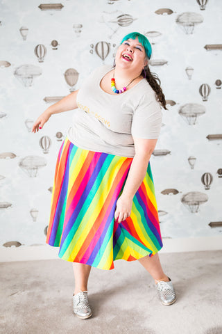 Joanna gleeful in a plus-size rainbow skirt