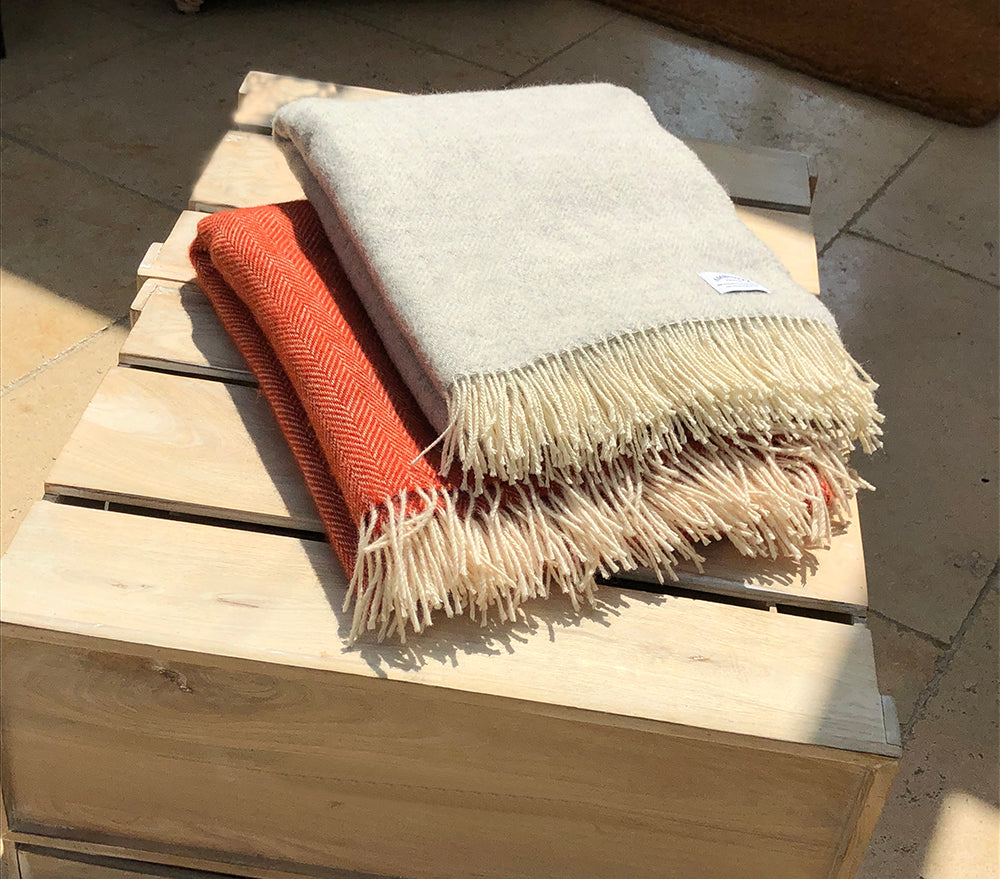 Orange and grey throws