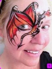 Laura Oliver Dragon Face Paint design fusion body art