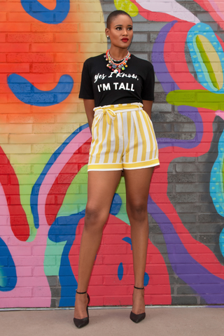 HEIGHT GODDESS graphic tee styled with high waisted shorts