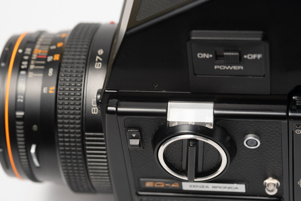 Side of viewfinder of Bronica SQ-A Medium Format Film Camera with 80mm 2.8 Lens, Speed Grip, and Metered Prism Viewfinder