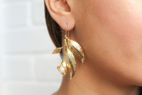 gold dangle designer earrings