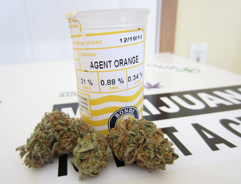 Agent Orange Cannabis nugs and a dispensary bottle, image from Mrs Nice guy.com
