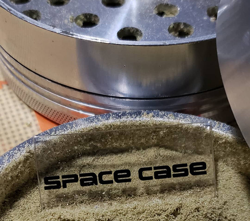 Grinder kief catcher in a Space Case herb grinder, image from Big News Farms on Instagram