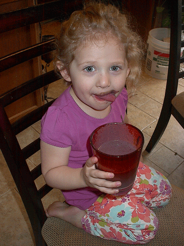 Kylee with purple green smoothie