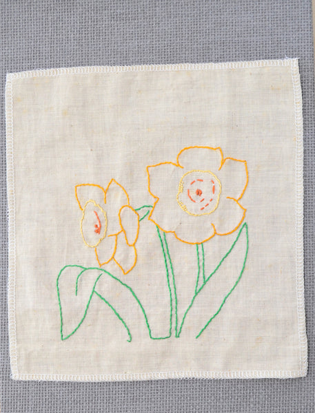 Daffodil embroidery that was started by the grandmother of Amy Reader - a fiber artist in Charlotte, NC