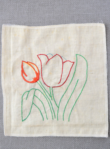 Partially embroidered tulip that was started by the grandmother of Amy Reader - a fiber artist in Charlotte, NC