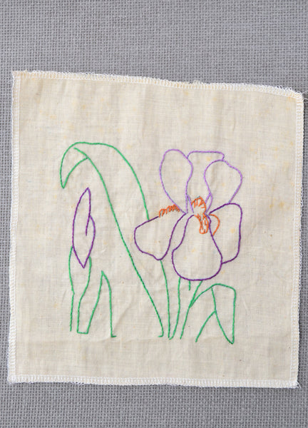 Partially complete orchid embroidery that was started by the grandmother of Amy Reader.