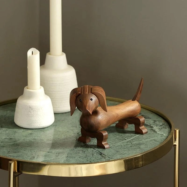 Image of a Dachshund Statue standing on table made of walnut solid wood material
