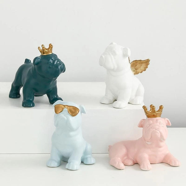 Image of four English Bulldog Statues made of ceramic in four color - white, pink, light blue and teal