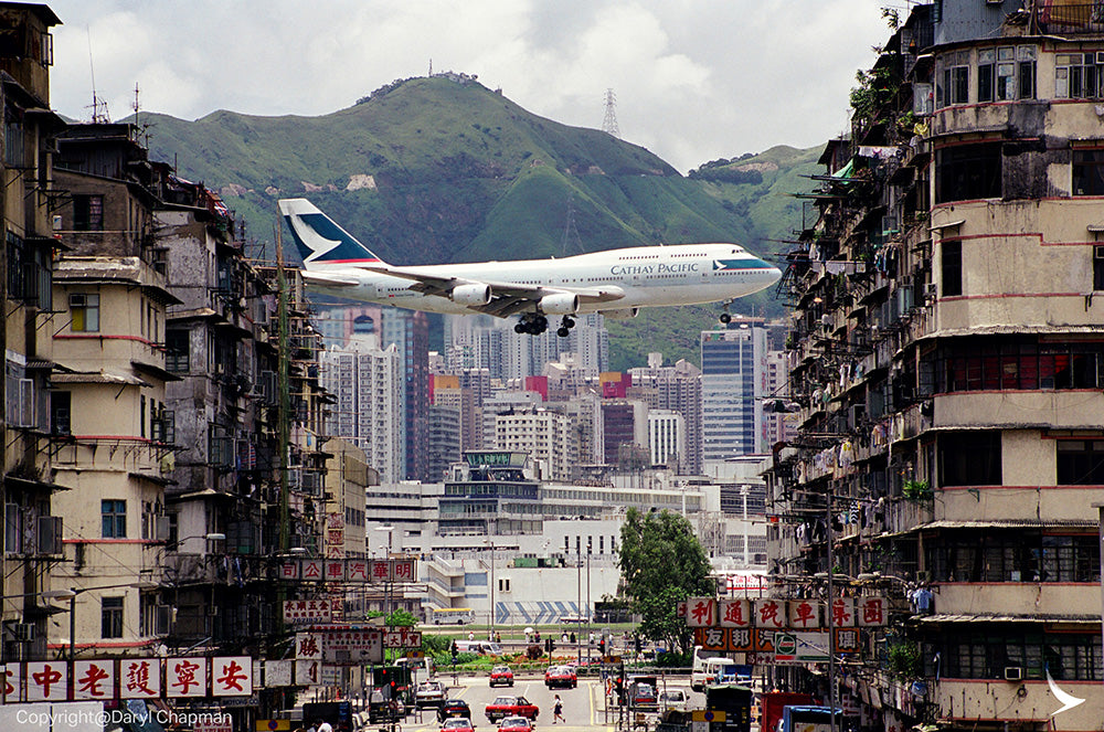 Cathay Pacific Boeing 747 over Kowloon flying into Hong Kong Kai Tak Airport