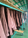 painted leather hanging to dry
