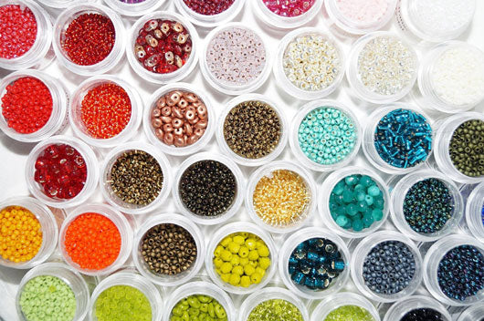 Multiple containers of beads