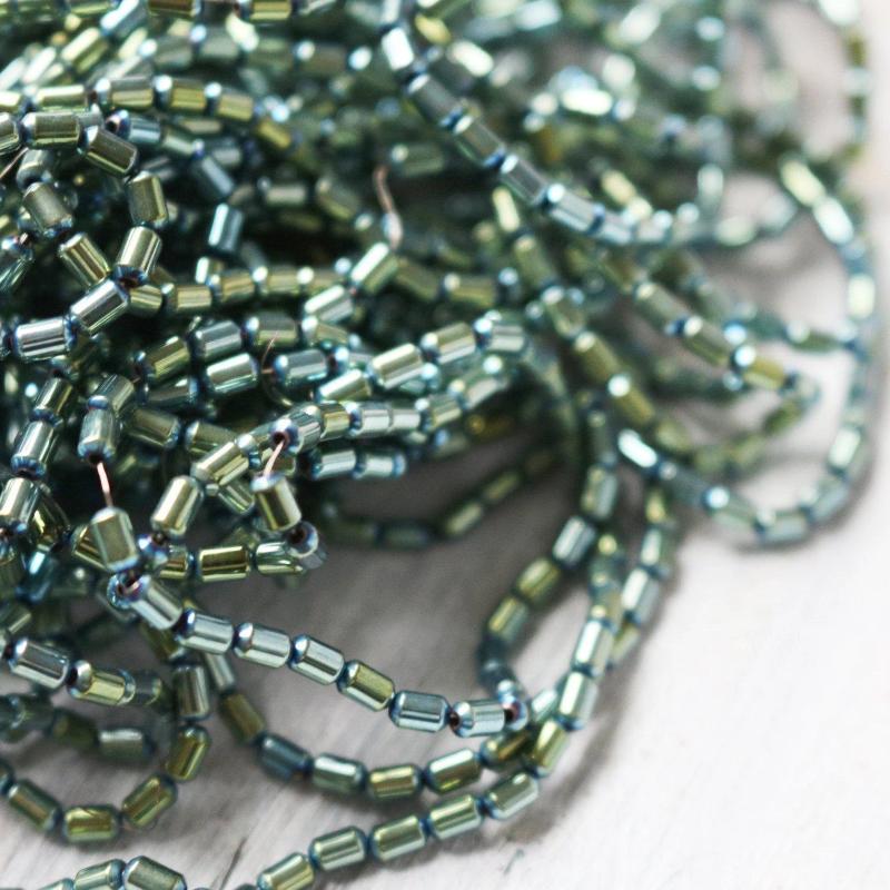 4mm hematite side tube beads 16" strand green color 
