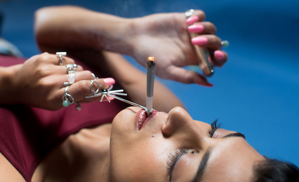 smoking shot-tons of silver rings - cannabis joint holder Dopeafide - Nusheen Bakhtiar