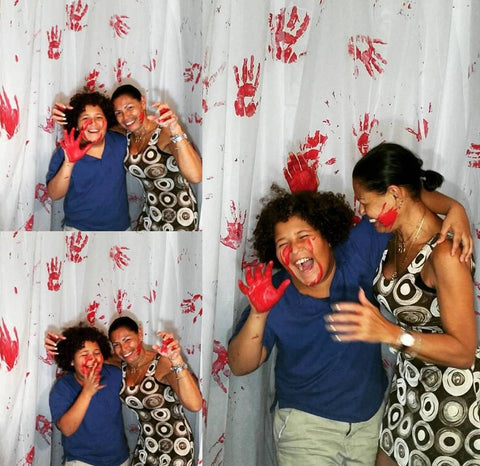 Halloween party photo booth bloody hand wall