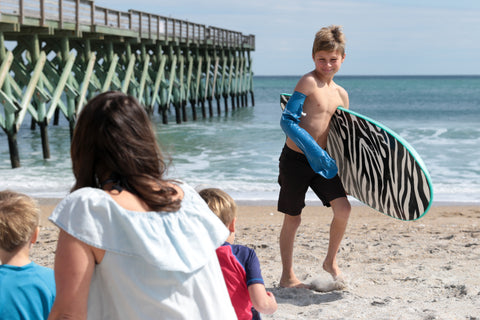 Broken arm broken limb beach waterproof cast cover mom son surfing swimming