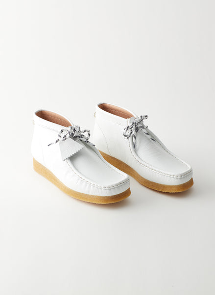 white wallabee shoes