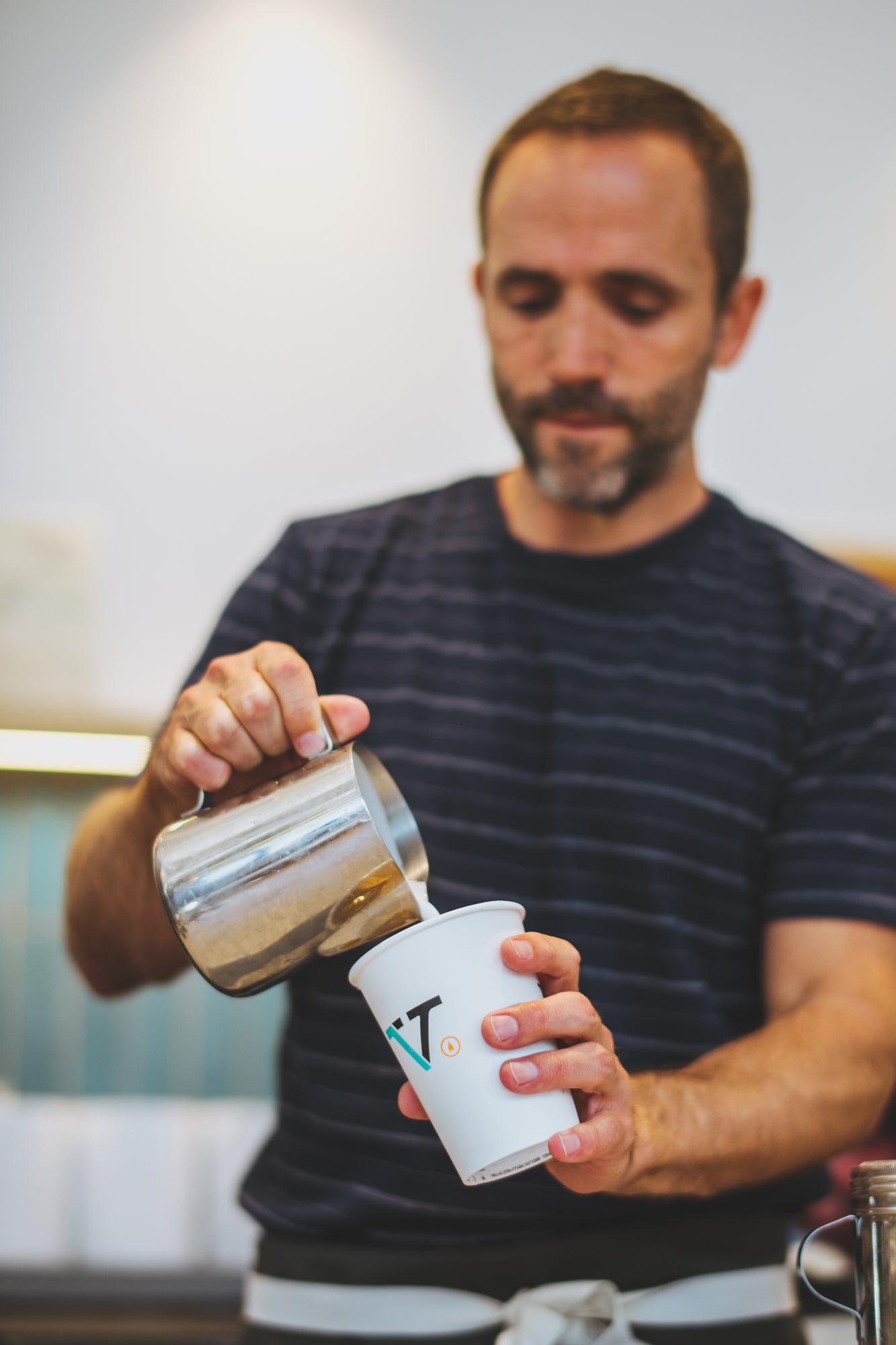 Verve co-founder, Ryan O'Donovan, pouring lattes