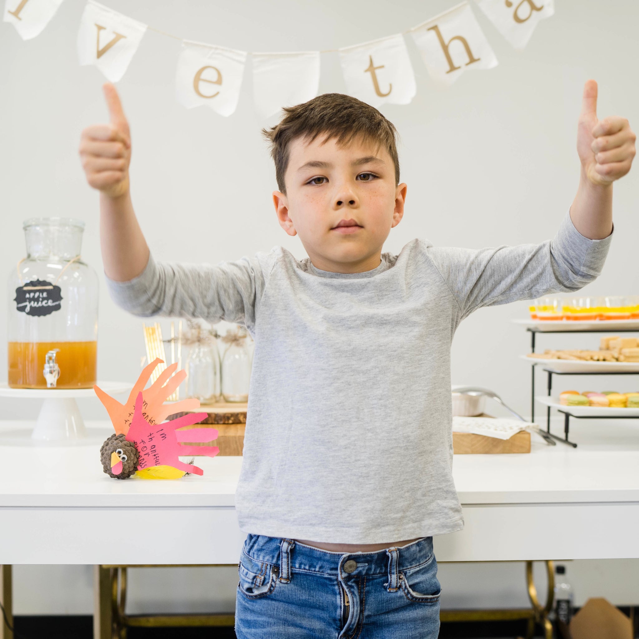 setting up an interactive kids table at thanksgiving to build social emotional skills 