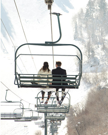 Bride and Groom riding a ski chairlift up up and away...off to their winter wonderland honeymoon