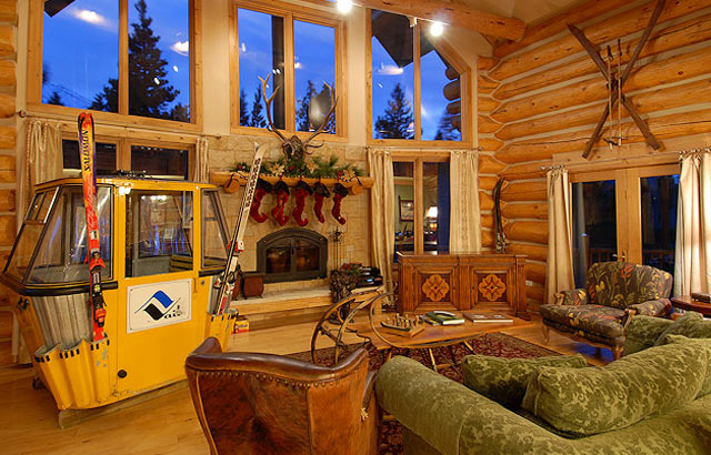 Vintage ski gondola, wooden skis and other ski decor compliment this mountain home.