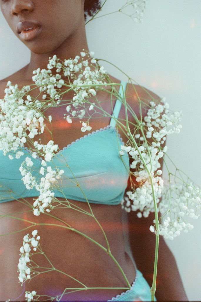 Closeup of woman in green bra