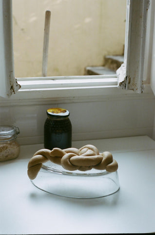 Bread dough twisted laying by the window.