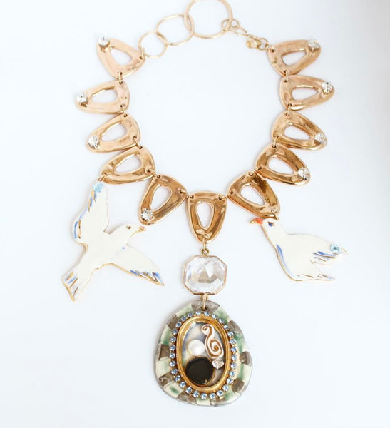 Gold necklace with birds