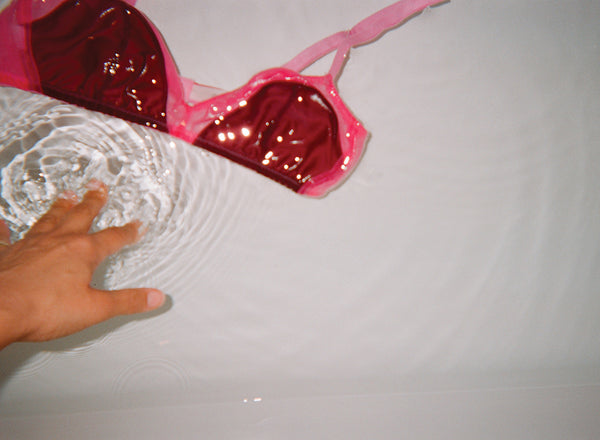 A red bra soaked in water.