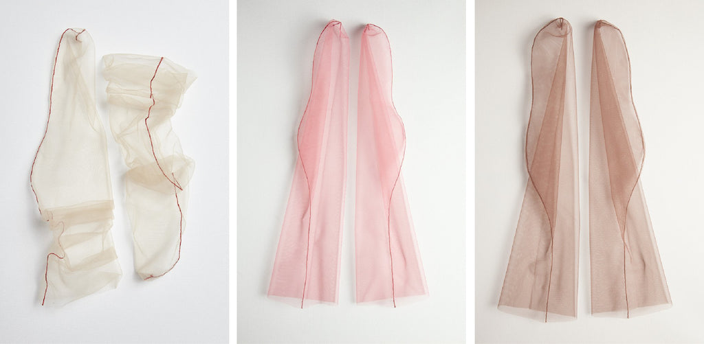 Pieces of white, pink, and brown tulle.