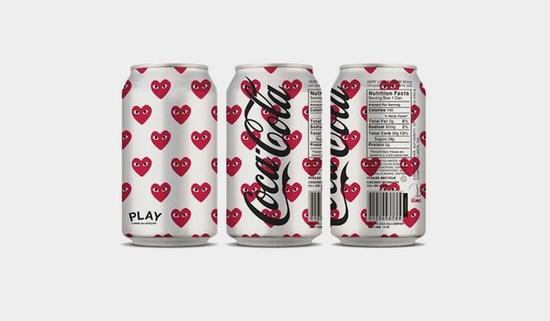 Coca-Cola cans with Comme des Garcons heart pattern.