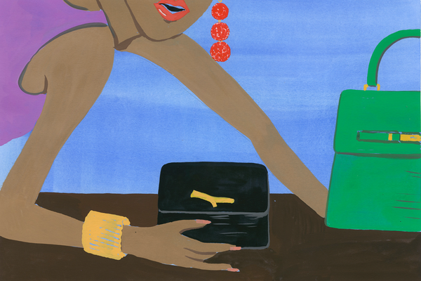 Woman in jewelry holding a black wallet and a green purse.