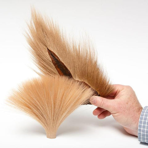 Faux Bucktail next to Natural Bucktail Flymen Fly Tying