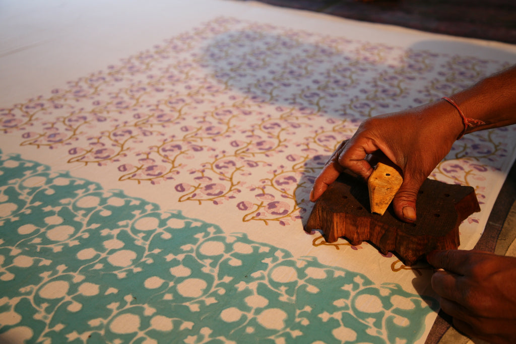 block printing process showing layers of color