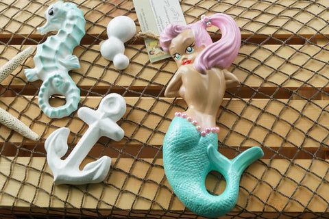 Retro chalk ware mermaids by BarbieK