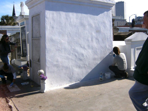 Marie Laveau's Grave being restored by the caretakers at the St Louis Cemetery in New Orleans
