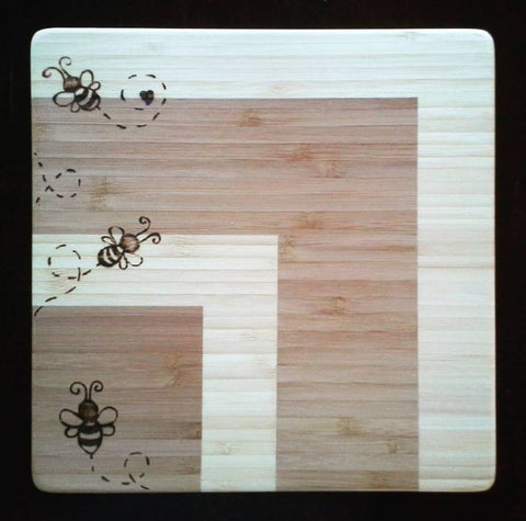 Cutting board with wood burned illustration