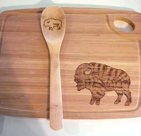 Cutting board and spoon with wood burned Buffalo illustration