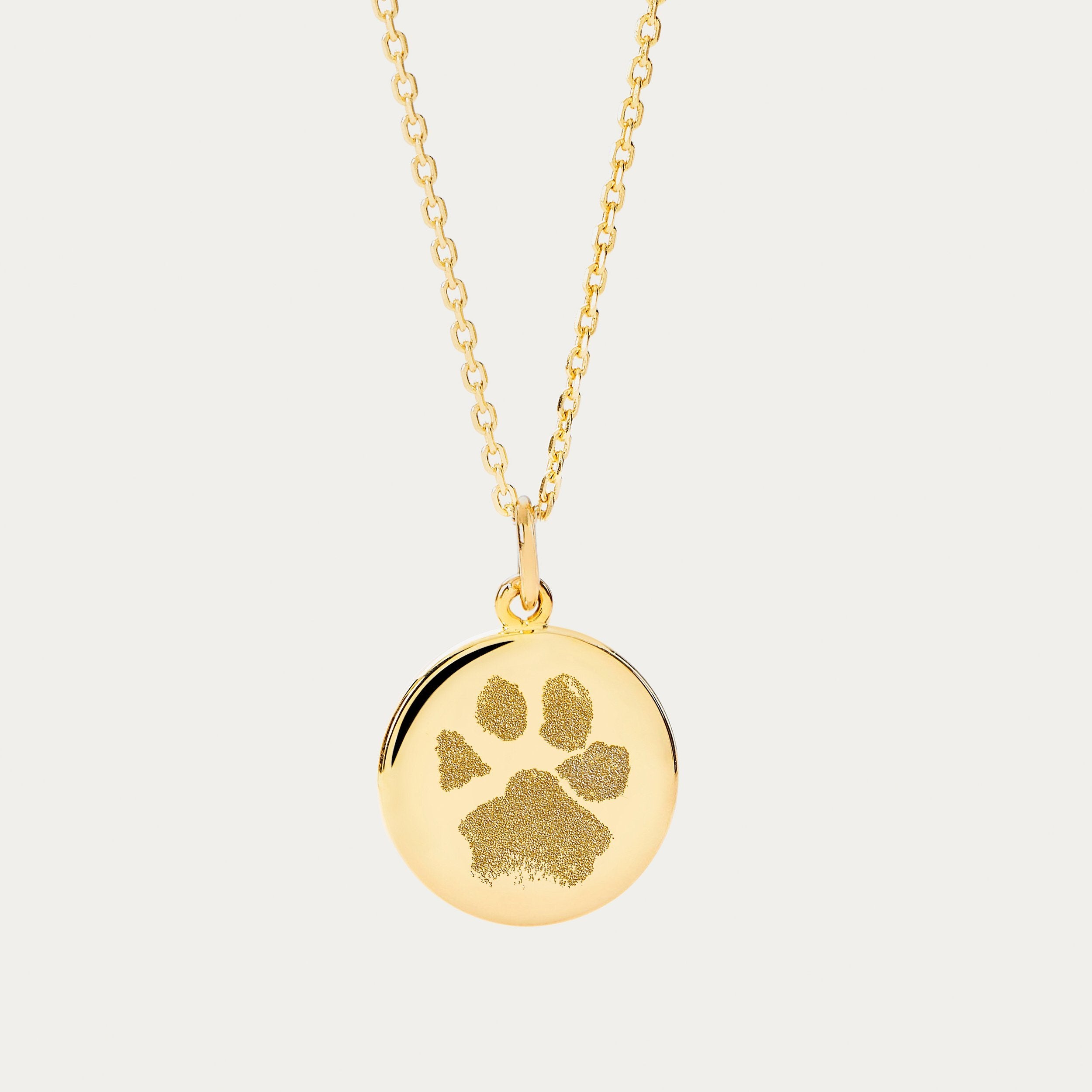 gold and diamond paw print necklace