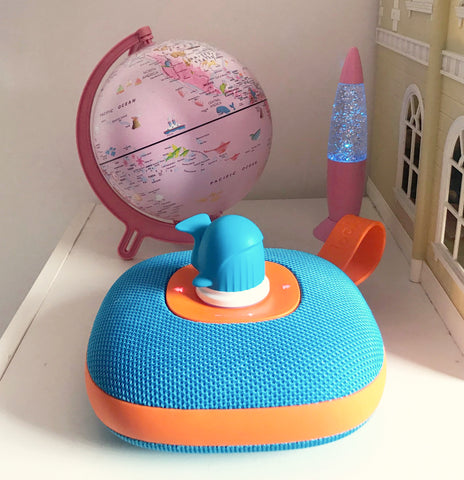 Jooki music player with Whale token, Pink Globe in background of kids room