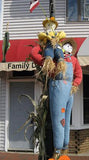 A Little and Big Scarecrow on a Lamp Post