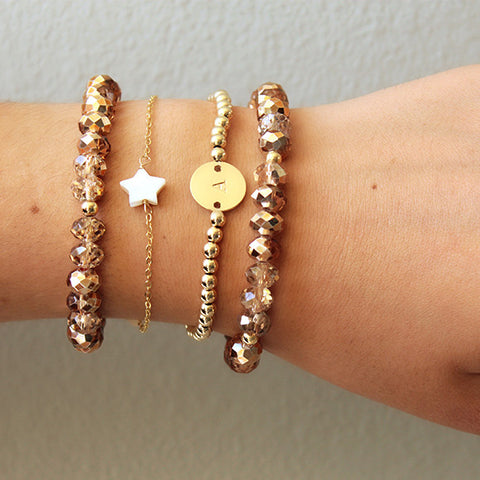 taudrey how to stack bracelets arm party 