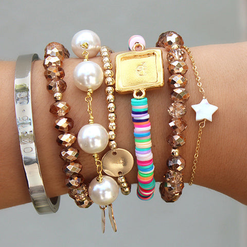 taudrey how to stack bracelets arm party 