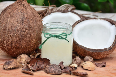 Coconut with oil in jar