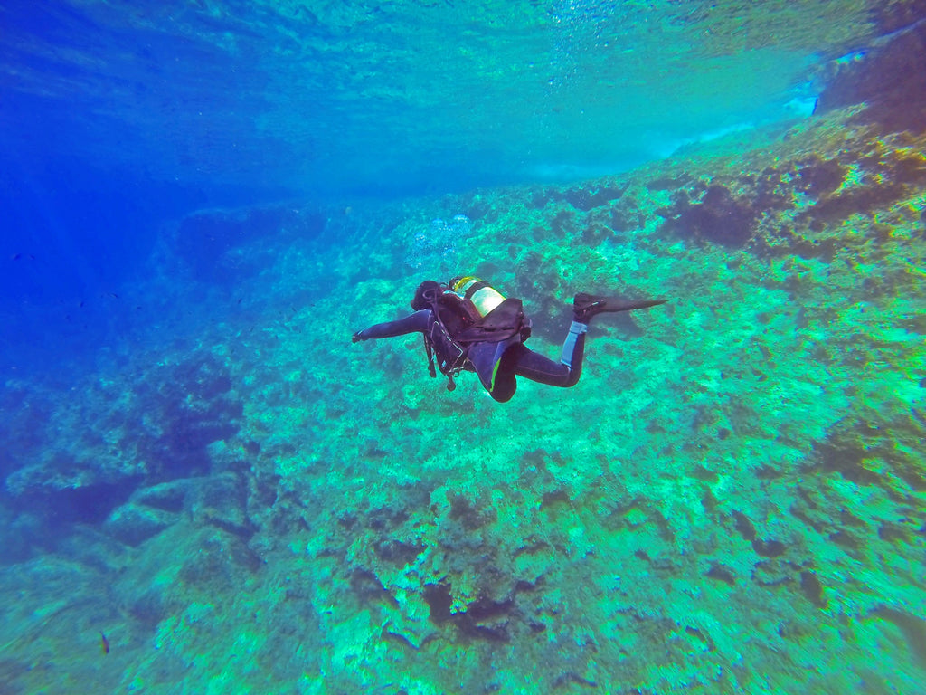 Figure scuba diving in Malta