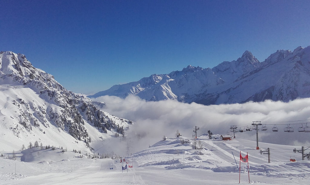 Snow-filled ski resort under a clear sky