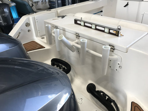 Install your rod holder when the outboard motor is down 