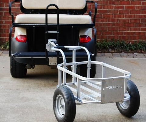 Golf cart pulling a utility cart using V-Lock